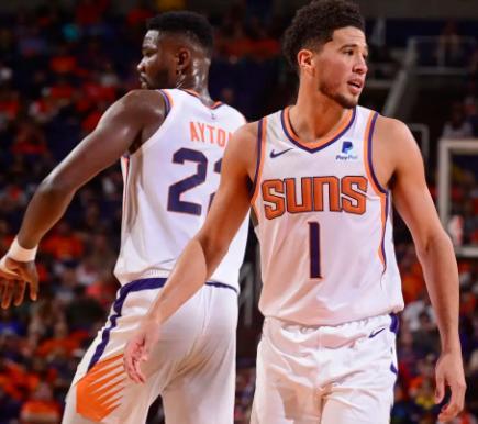  布克手感火热太阳主场击退西部劲旅